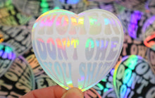 Load image into Gallery viewer, Holographic Women Don’t Owe You Sh. Sticker