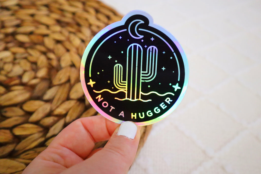 Holographic Not A Hugger Sticker